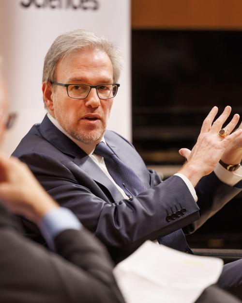 Person speaking and gesturing