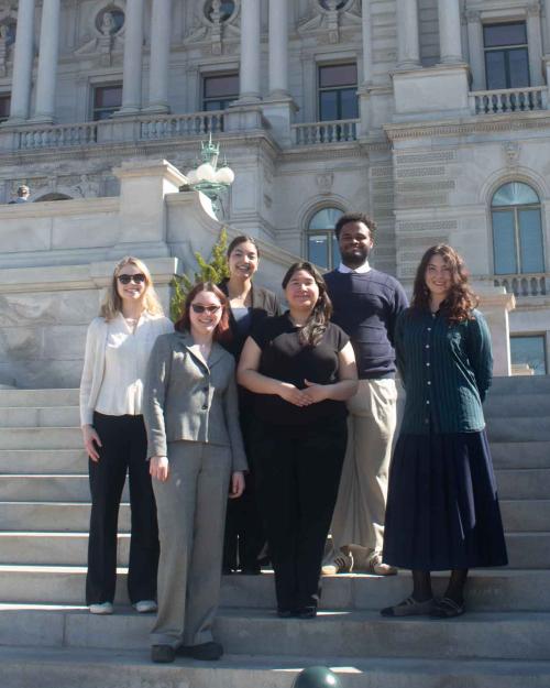 people standing in front of Library of Congress