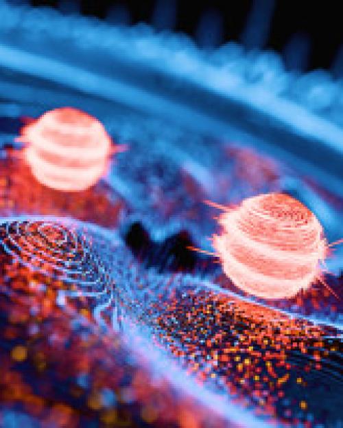 Two glowing red balls situated on blue waves