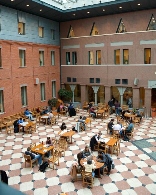 people working in a cafe