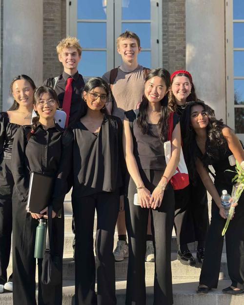 people standing on steps on Bailey Hall