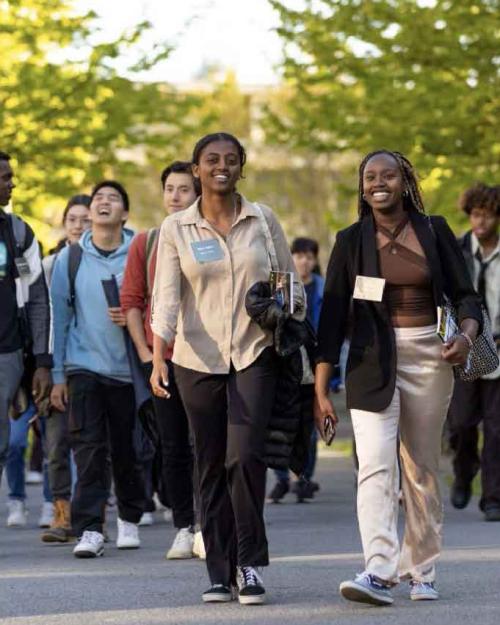 a group of people walking outside