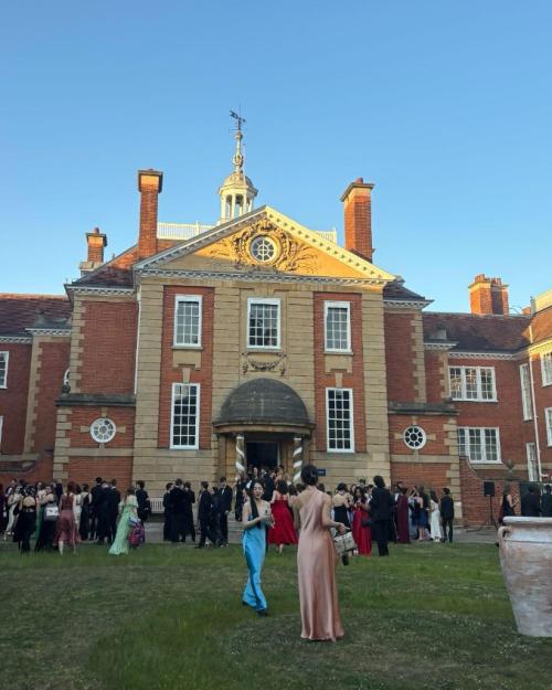 people in front of a historic building