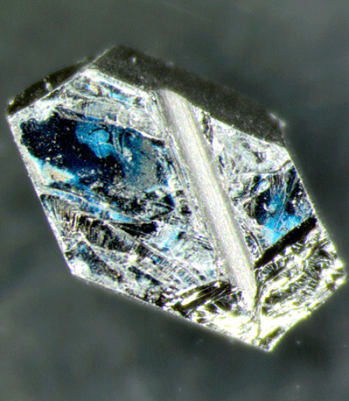  Hexagonal chip of uranium ruthenium silicide (URu2Si2)