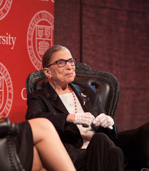  Ruth Bader Ginsburg seated in a chair