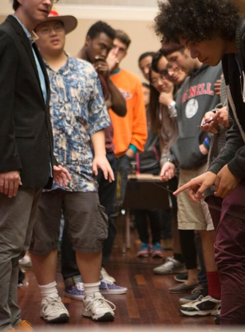  A group of students observe an object on the floor