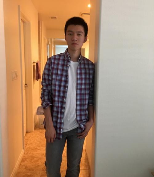  Yunxuan standing in a hallway