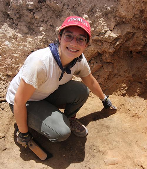 Student at archeological dig site