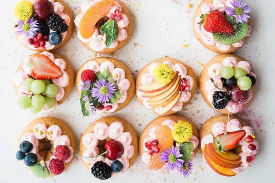 Donuts decorated with fruit and flowers
