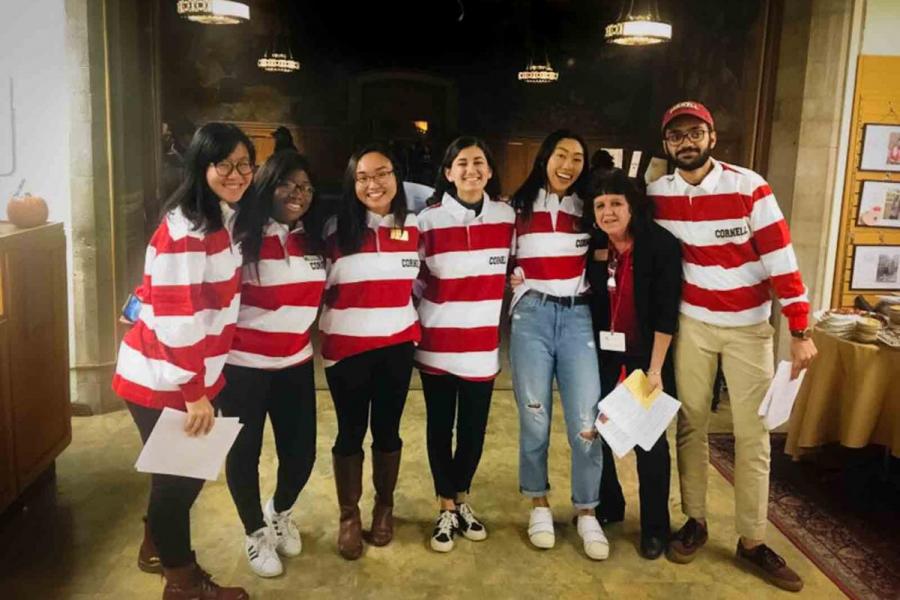 group of people in striped shirts