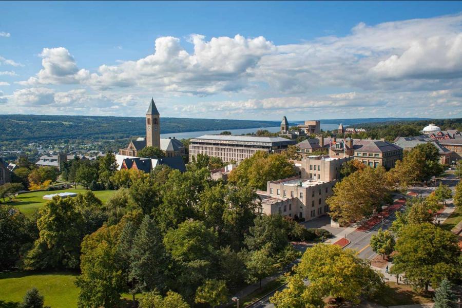 View of Cornell campus from above; under a blue sky