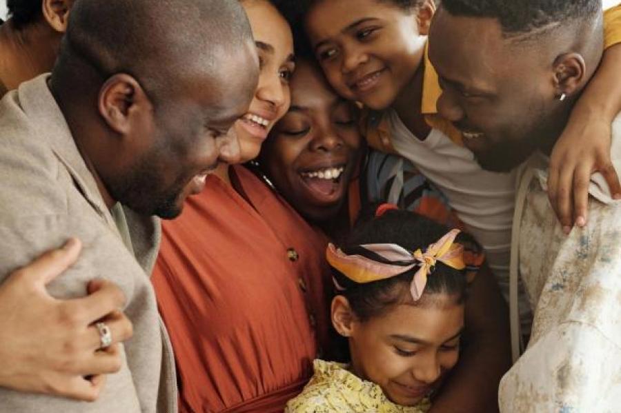 Family gathering for a group hug