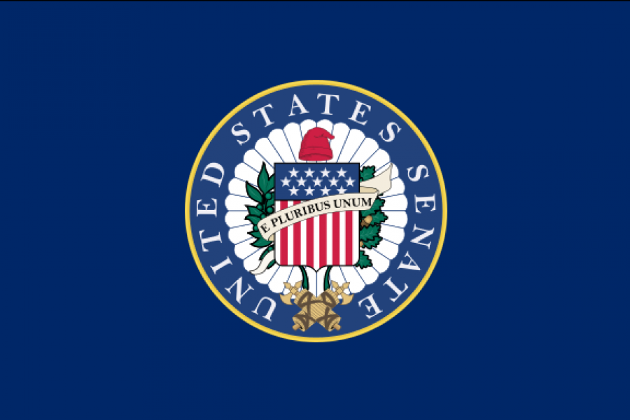 Flag in the center of a circle with "E Pluribus Unum" across it