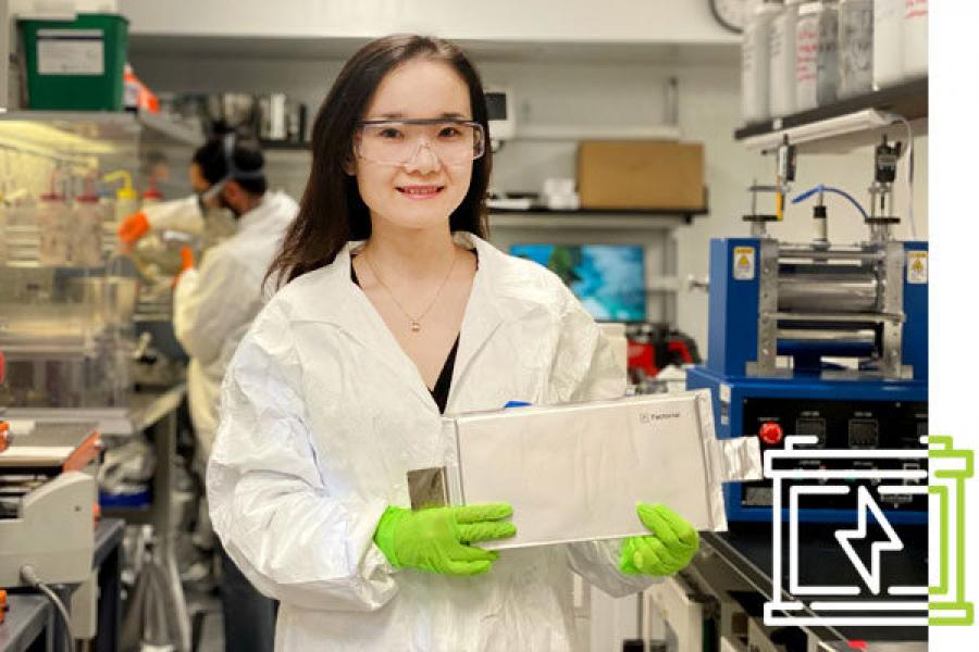 Siyu Huang holding a battery