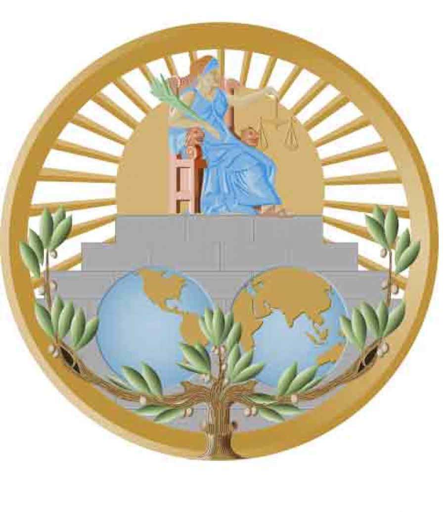 A brown circle with spokes pointing in to a seated female Roman figure of justice holding scales.