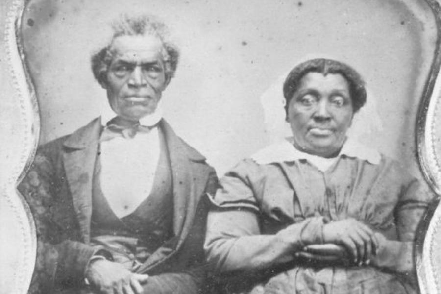 man and woman in black and white photo