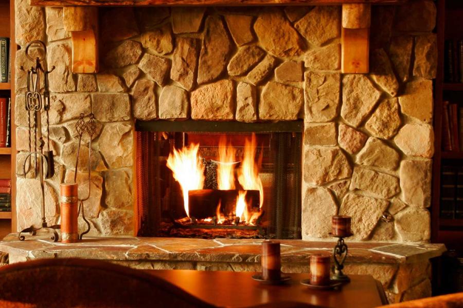 Stone fireplace, lively flames