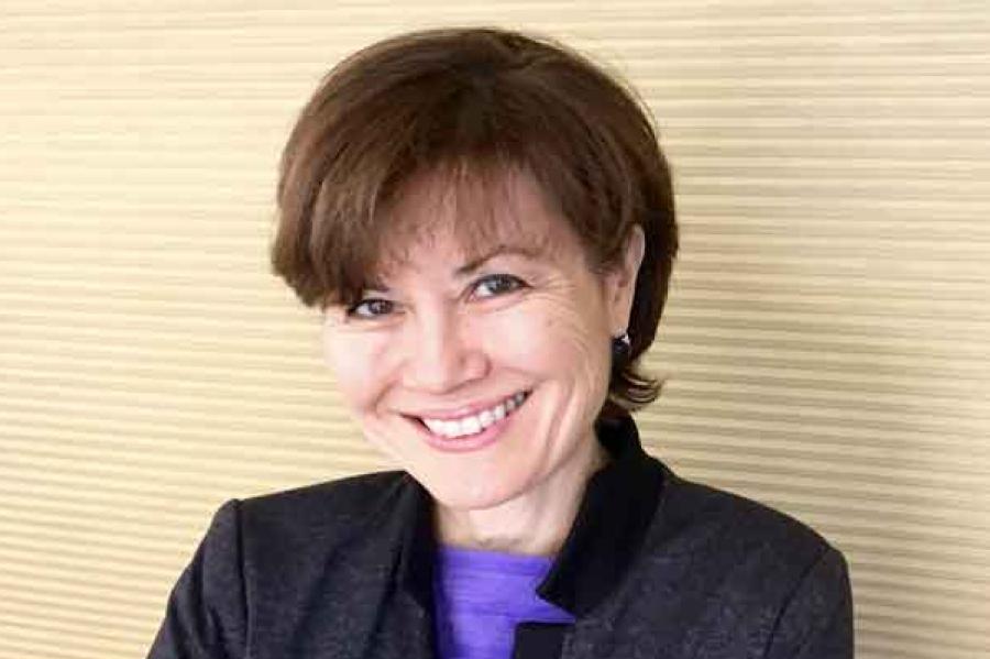 woman standing in front of wall