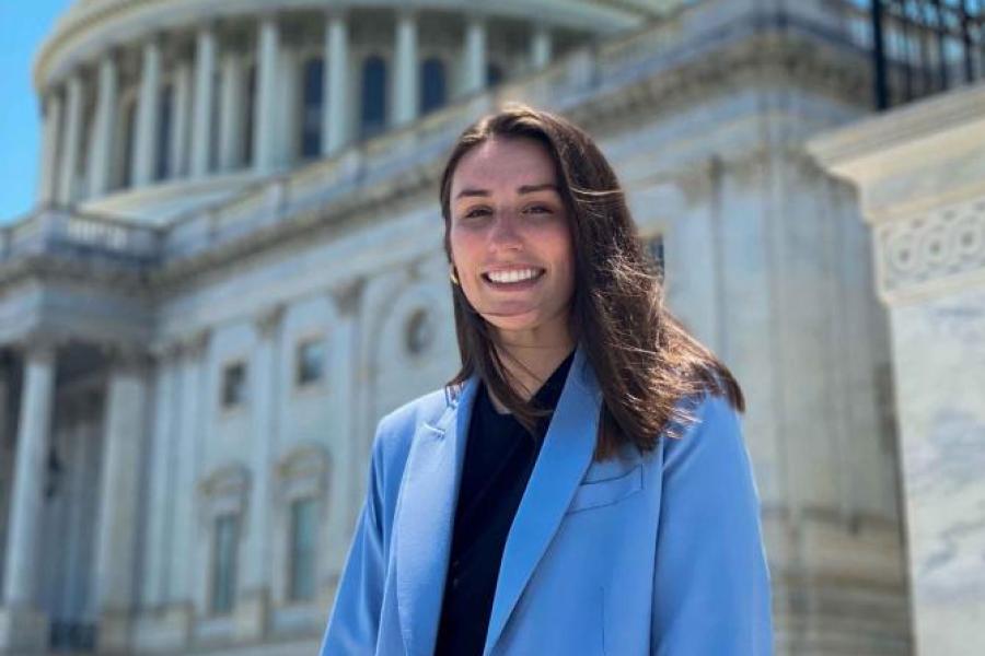 women in front of US Capitol building