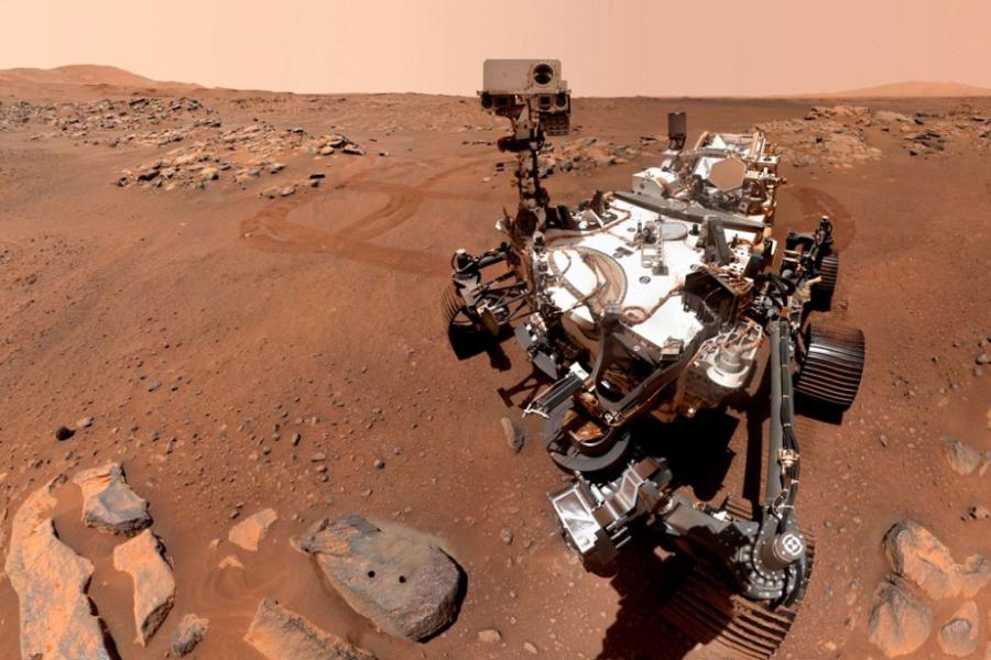View from Mars: red landscape and robot