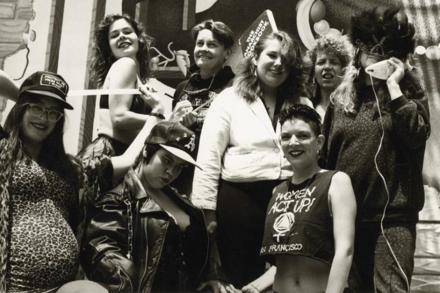 Black and white photo (1984) of a eight people 