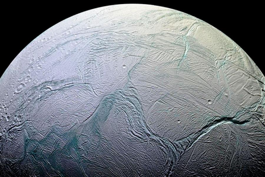 Pale, textured celestial body: the moon Enceladus