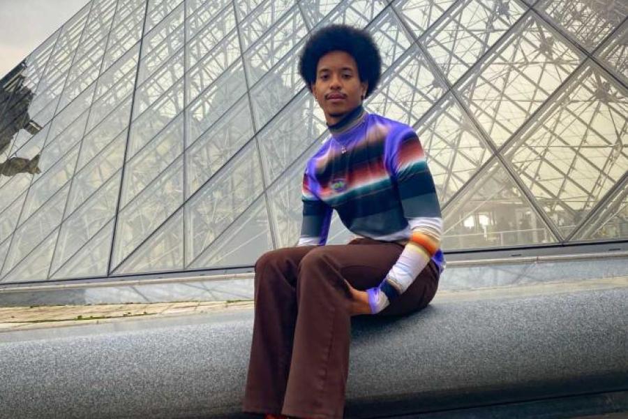 man at louvre museum