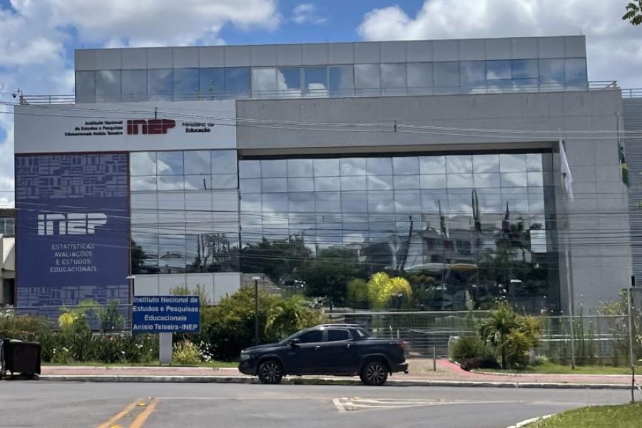 Building with reflective windows under a blue sky