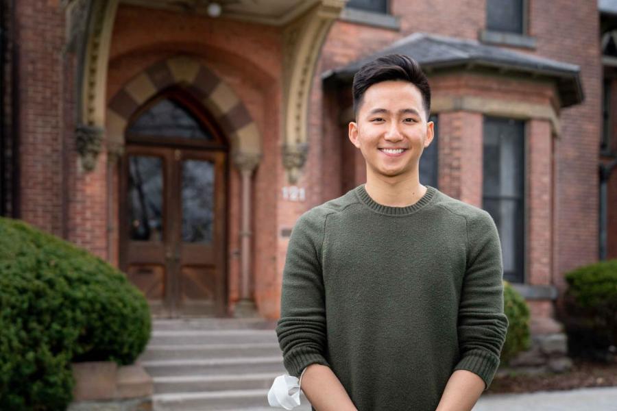 man outside brick building