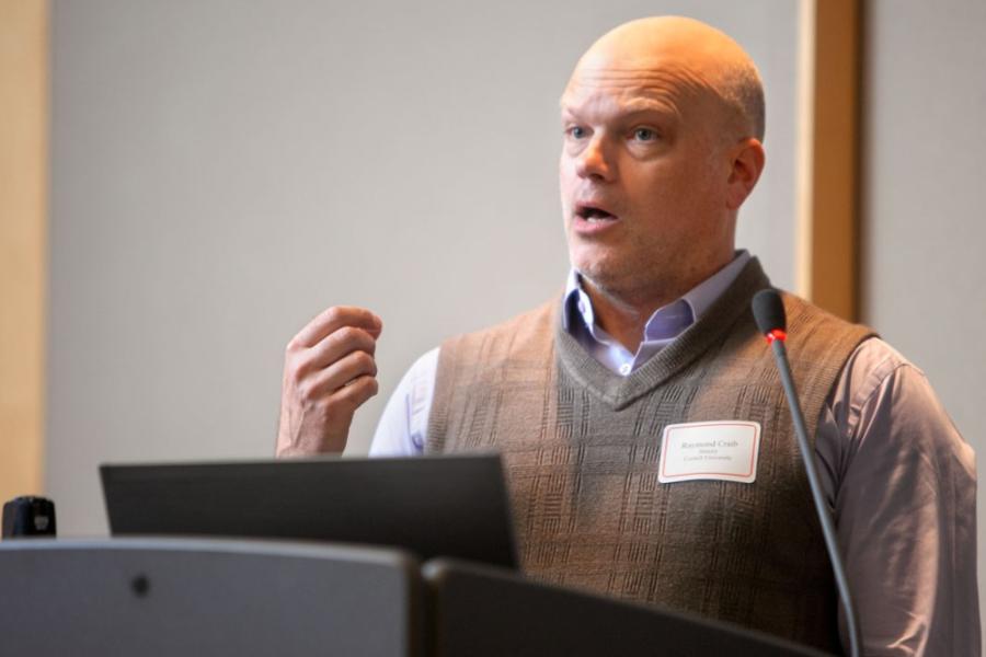 Person lecturing at a podium