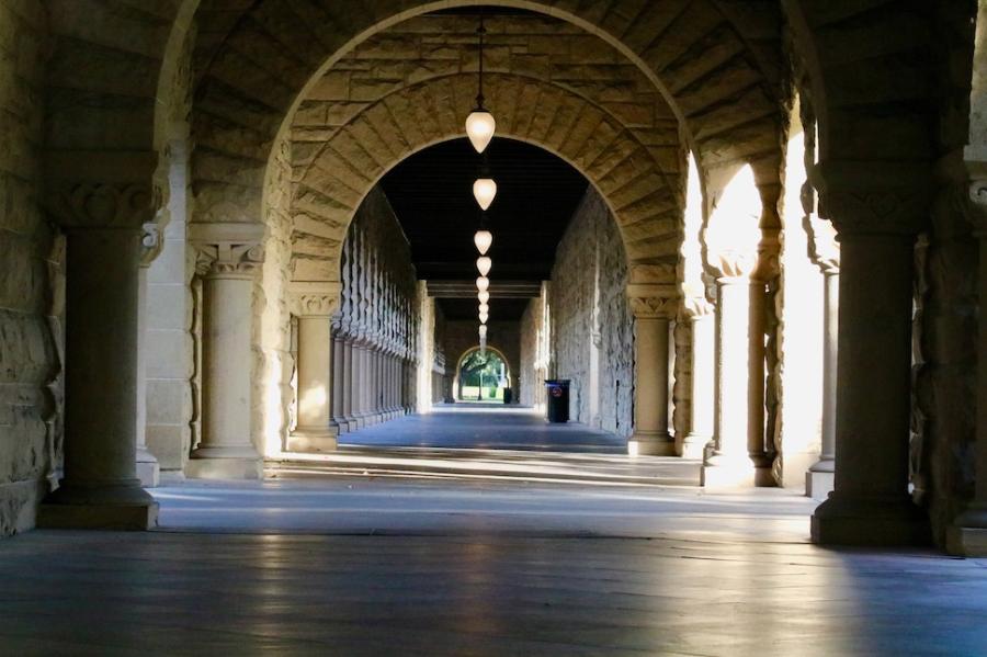 Arched hallway with sunlight