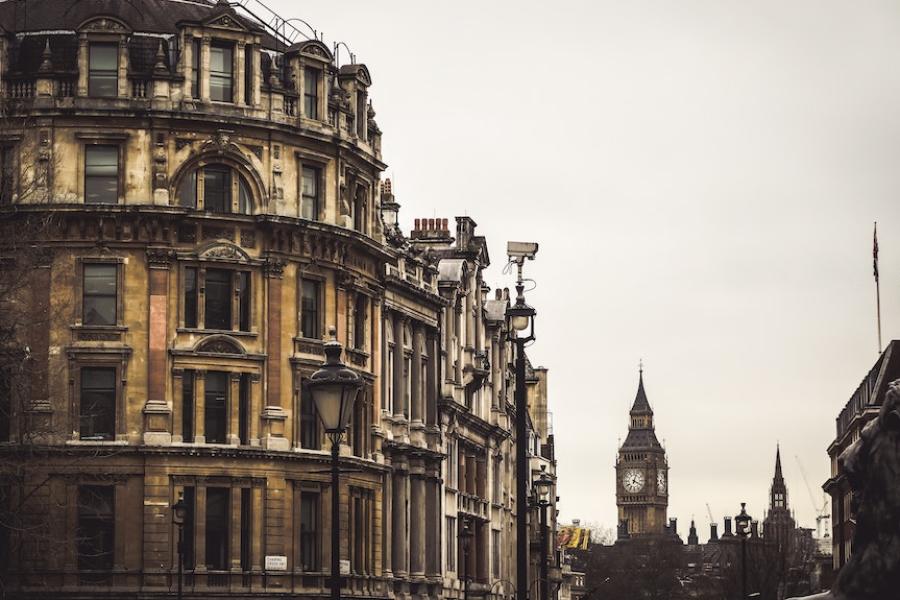 Drab buildings under a cloudy sky: Big Ben reconizable in the distance