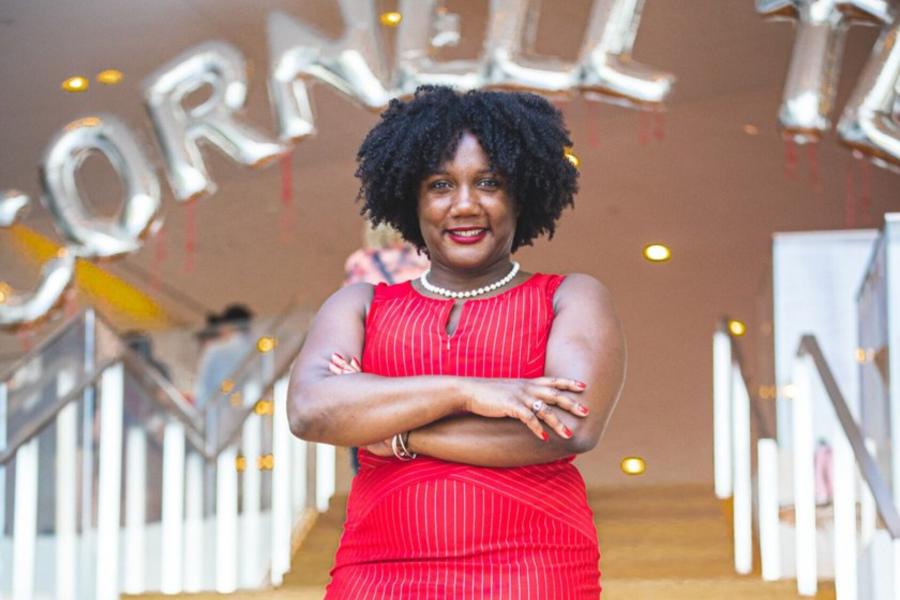 woman in front of a staircase