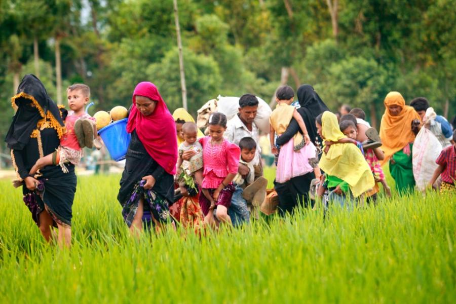 Migrants carry everything they own to find a better life in a new home.