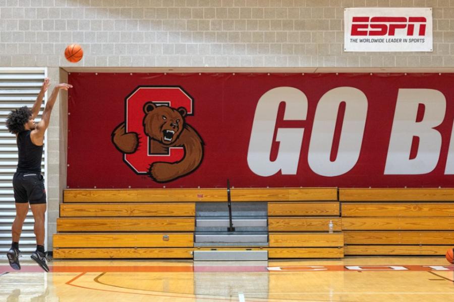 Person shooting a basketball