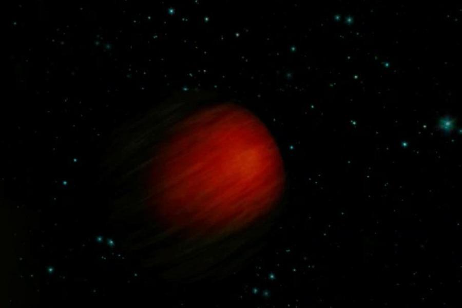 very dim red sphere – a planet – in dark space