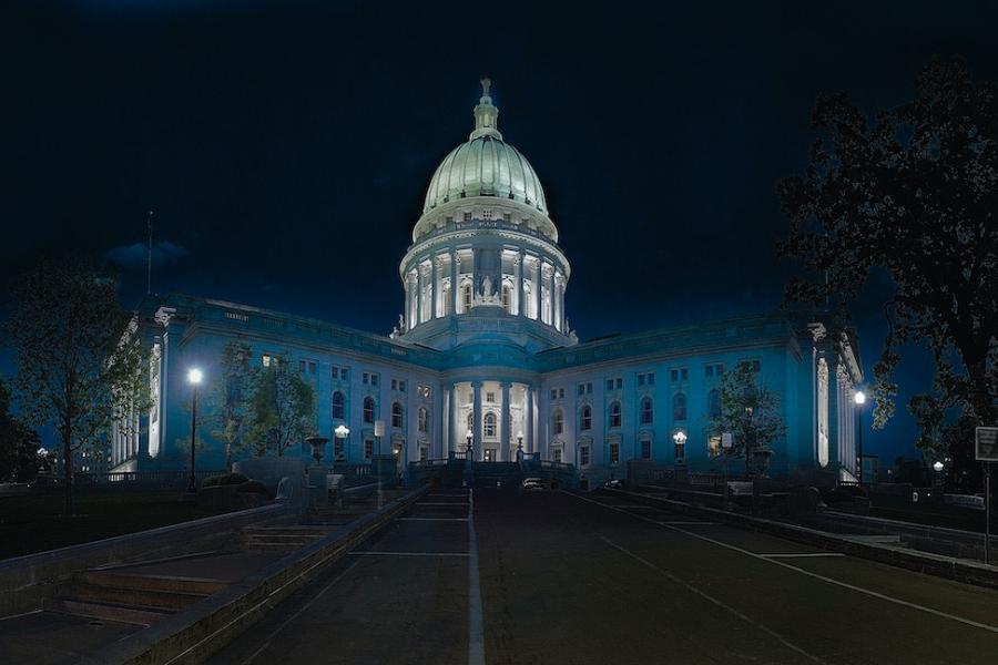 White domed building lit up at night