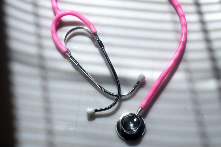 doctor's stethoscope with a pink cord
