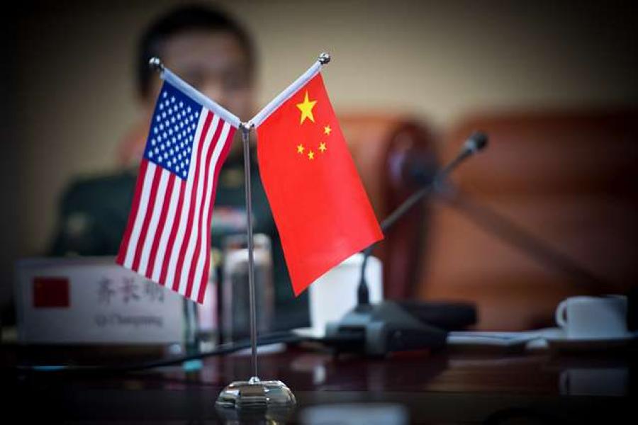 Two small flags on a table top