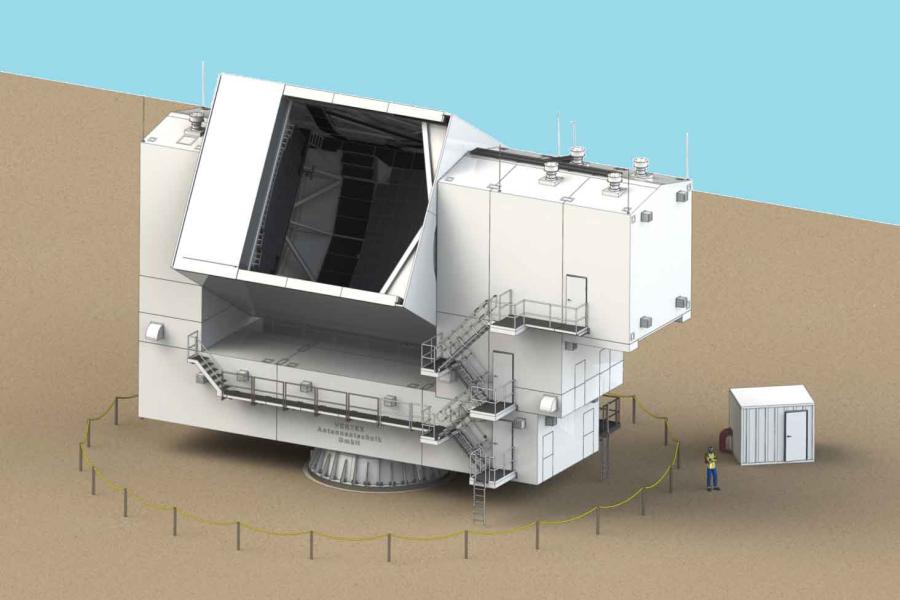 The telescope is a 3-story white rectangle-shaped box with a big opening at the top. with stairs on the outside.