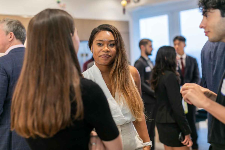 three people talking