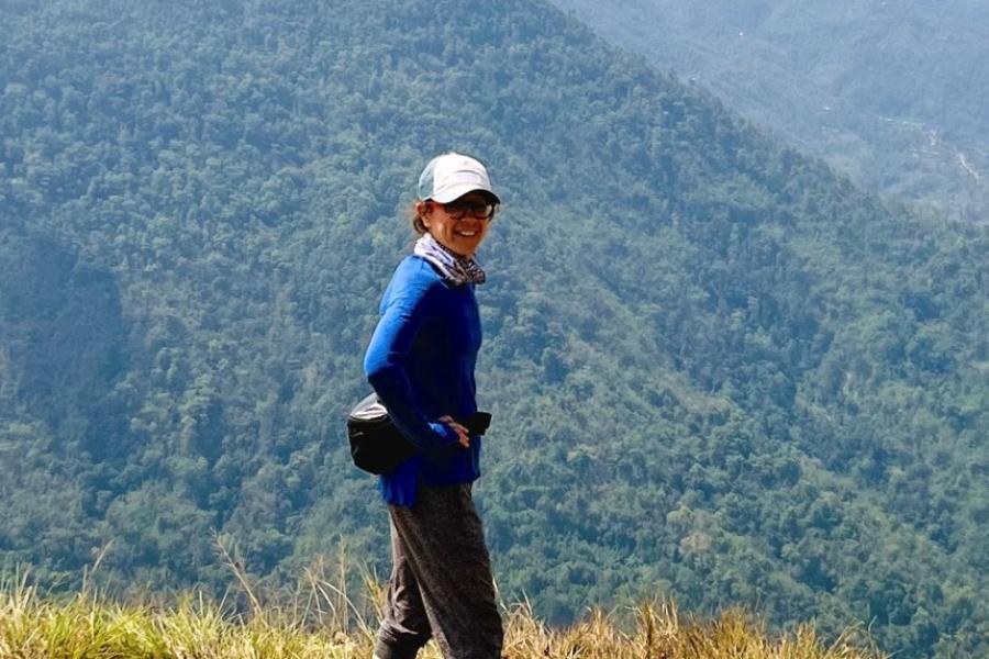 person on top of mountain