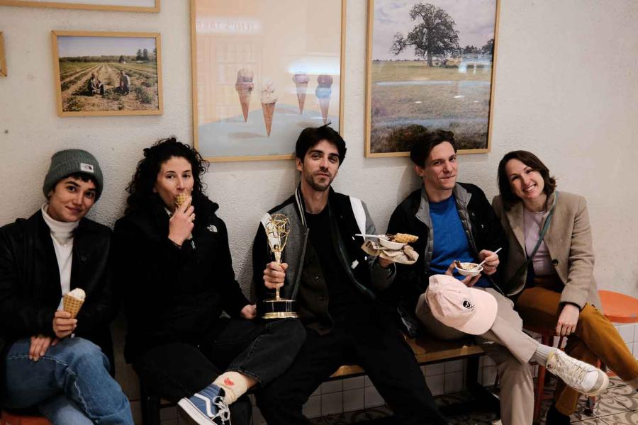 five people eating ice cream