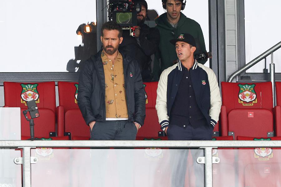 camera person behind two movie stars