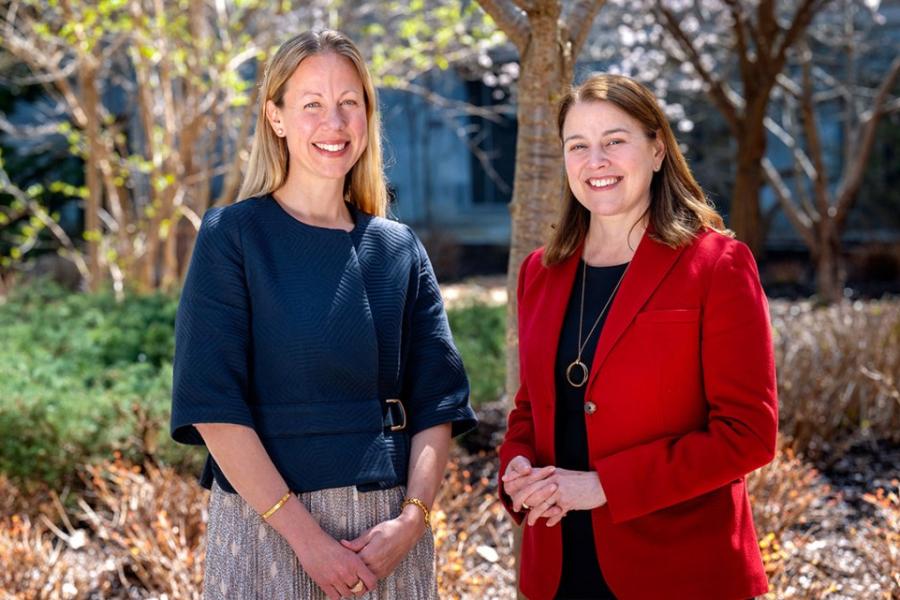 Rachel Beatty Riedl, left, the Einaudi Center’s director and John S. Knight Professor of International Studies and professor in the Department of Government in the College of Arts and Sciences and the Brooks School, and Colleen Barry, Brooks School dean.