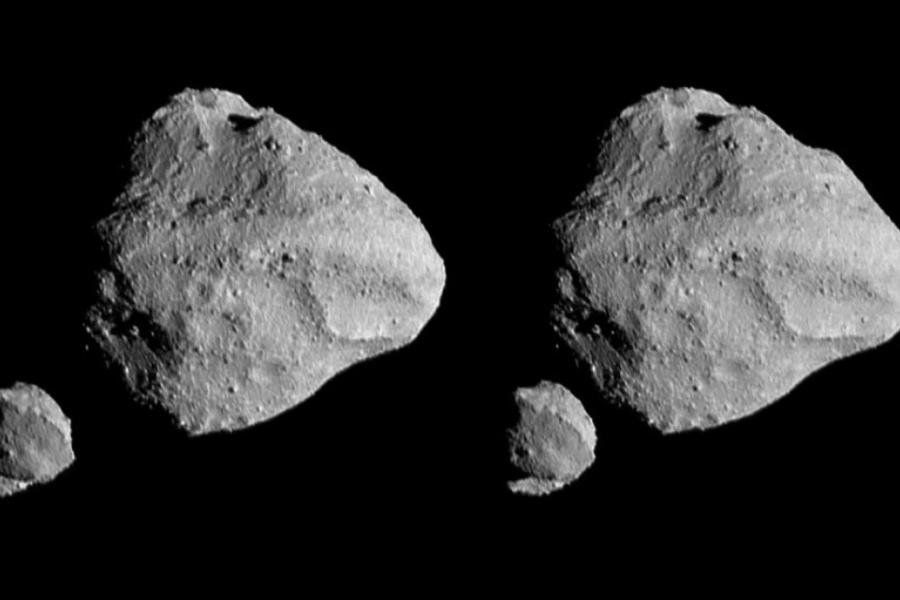 Four rocky objects against a black background