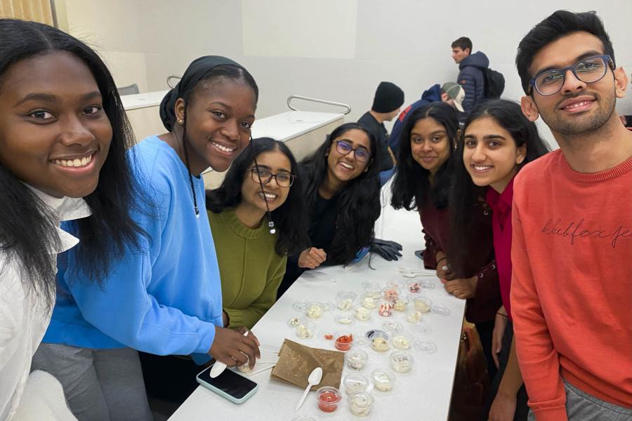 people around a table eating ice cream