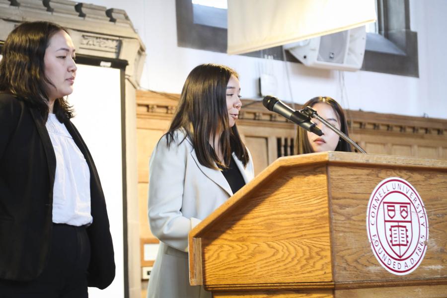 person speaking at a podium