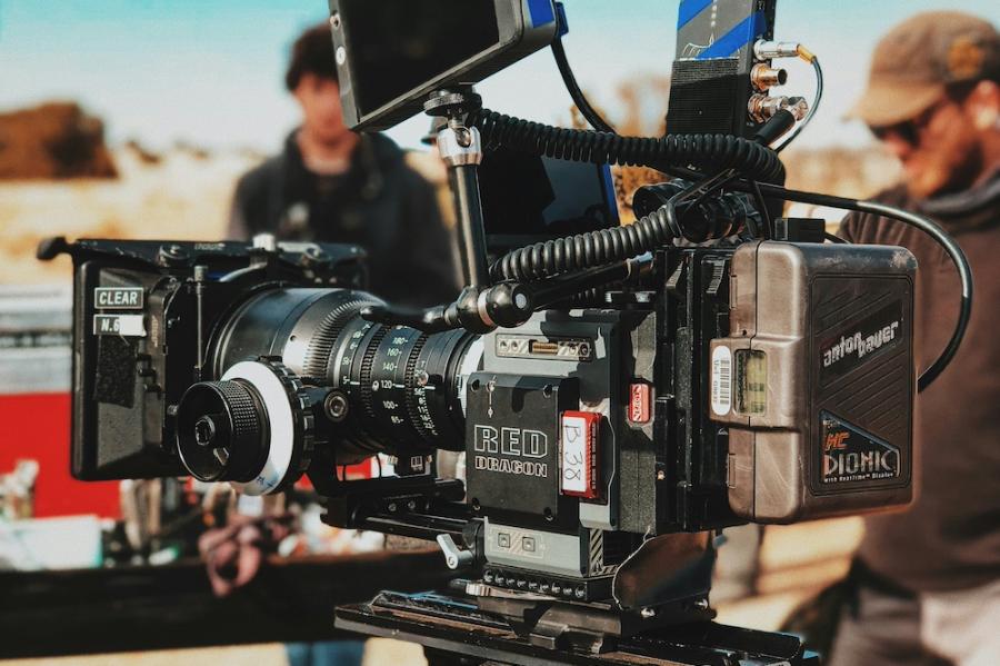 Film camera on location in a sunny place