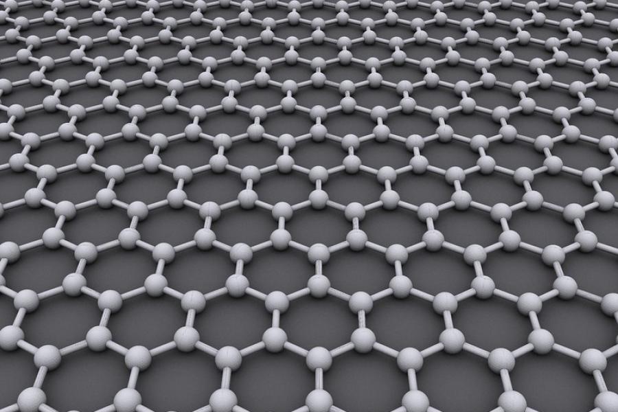A field of connected hexagons against a dark gray background